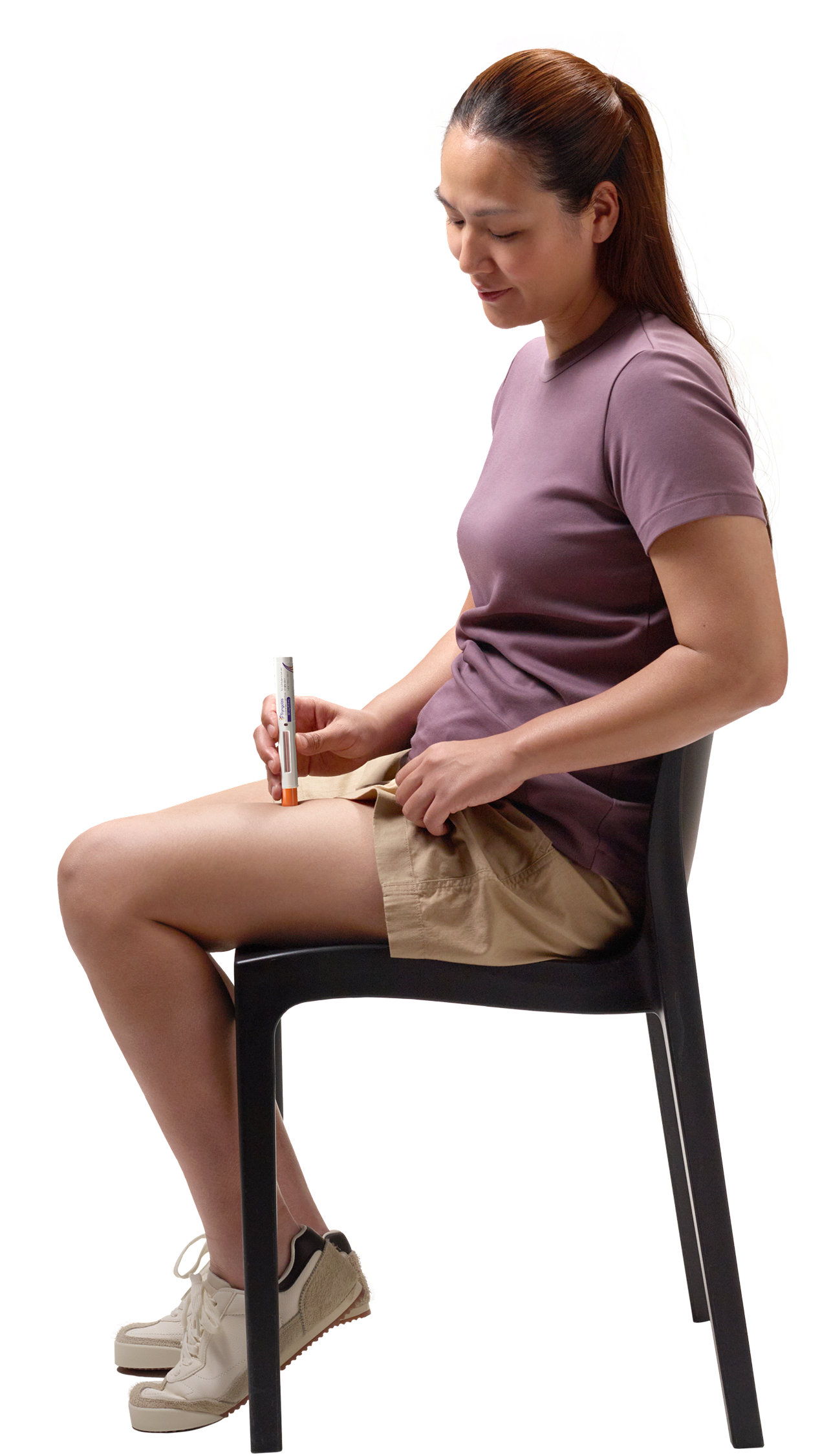 Actor portrayal of patient sitting while self-administering TRYNGOLZA Actor portrayal of patient sitting while self-administering TRYNGOLZA